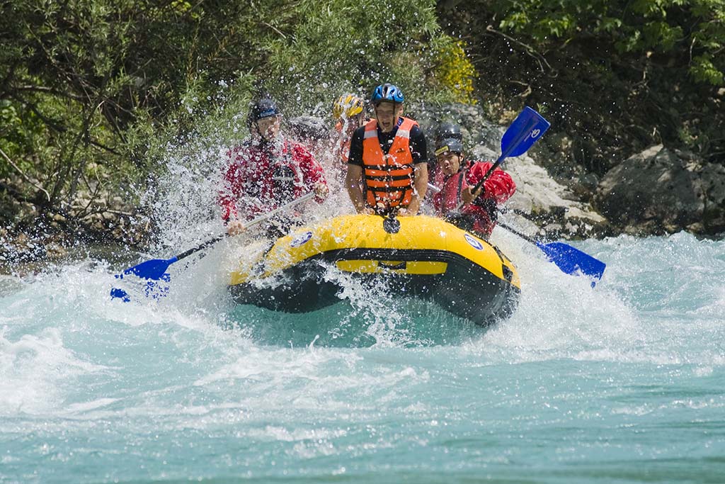 raft full of people on a river